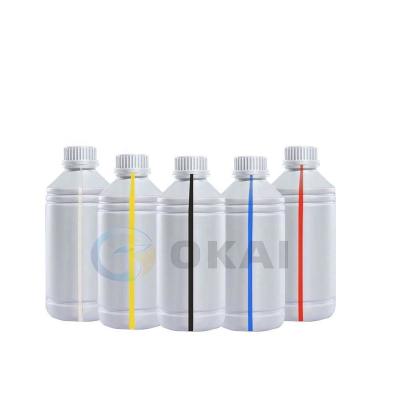 China DTF printine okai uv dtf ink 1000ml for white ink printer dtf ink dtf printer and hot melt powder PET film for sale