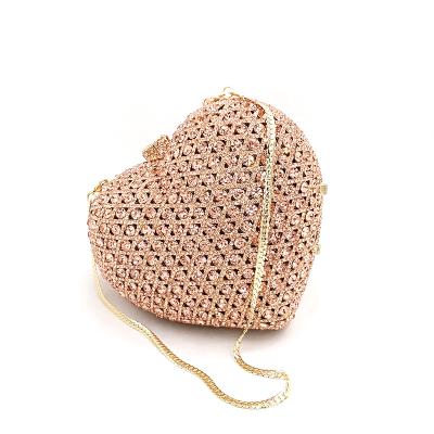 China High level drop shipping ladies party clutch wholesale wedding bridal purse hollow out boutique heart crystal clutches good quality for sale