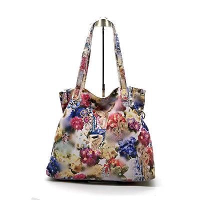 China Ladies shoulder bags for fashion summer women large outdoor bums feminine ladies good quality real leather flower snake printing top handle shoulder bag for sale