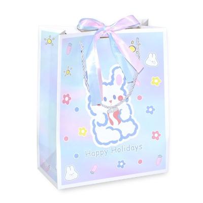 China Waterproof Children's Day Gift Bag Holiday Tote Bag Cream Rabbit Snack Recycled Paper Bag for sale