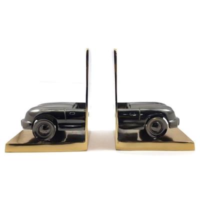 China Home Office AE-130 Unique Design Metal Bookends and Wholesale Decorative Creative Table Decor Book Stopper Design Book Stand Cheap for sale