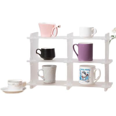 China Viable logo printed wholesale elegant transparent adjustable acrylic display stand for cup and dishes arts and crafts display rack for sale