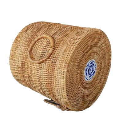 China Viable Clear Lines And Texture Cylinder Porcelain High Grade Rattan Woven Tea Cake Box for sale