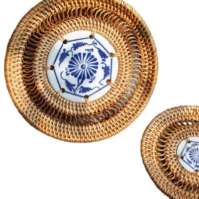 China Viable Rich Styles Of Coasters , Rattan Woven Round Porcelain Hollow Coaster for sale