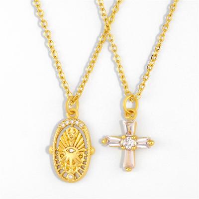 China Hiphop Wholesale Zircon Necklace Jewelry Rhinestone Demon Eye Cross Pendant Necklace for sale