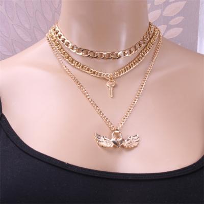 China Hip Hop Gold Jewelry Hip Hop Multi Layer Thick Chain Wings Love Lock Key Necklace For Men for sale