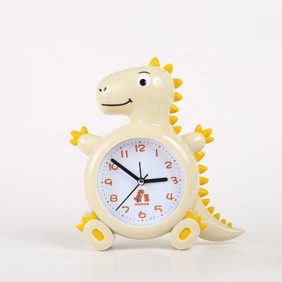 China Antique Style Cartoon Dinosaur Shape Alarm Clock Student Plastic Alarm Clock Children Gift for sale