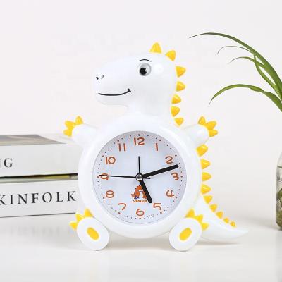 China Children Antique Plastic Alarm Clock Student Alarm Clock Shape Dinosaur Cartoon Style Small Wall Clock for sale