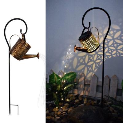 China Garden Amazon Solar Hollow Lamp Water Kettle Water Lamp Wrought Iron Outdoor Solar Shower Light for sale