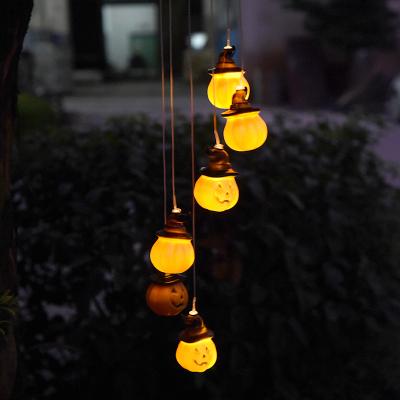 China Outdoor Waterproof Creepy Elf Patio Pumpkin Gollum Garden LED Solar Wind Bell Lamp Halloween Decorative Lights for sale