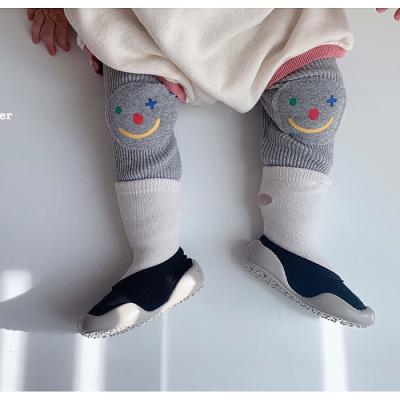 China Color Fade Proof Spring and Autumn Newborn Baby Cute Leggings Infant Knee Smiley Patch Outer Wear Pants for sale