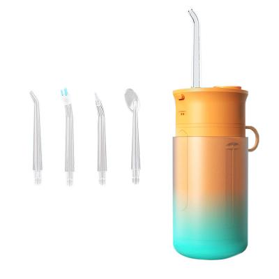 China Adjustable Portable Nozzles Retractable Storage 4 Tooth Cleaner 200ml Smart Magnetic Suction Loading Oral Care for sale