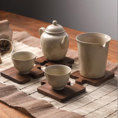 China Walnut Viable Tea Coasters Insulation Pads Solid Wood Wooden Puzzle Coasters Veneer Wooden Carpet Mats for sale