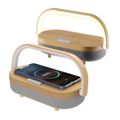 China Bass Stereo Sound Super Multifunction 4 in 1 Outdoor Mobile Phone Wireless Holder Stereo 5000mah Music Lamp Speaker Charger Portable Speaker for sale