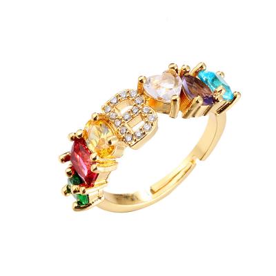 China Fashion TRENDY DIY Ring Copper Plated 18K Gold Inlaid With Colorful Lettered Zircon 26 Opening Ring for sale