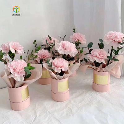 China Recycled Materials Paper Round Flower Box Cardboard Flower Box For Flower Packaging for sale