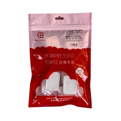 China Home Widely ApplicableWater Absorbent Disposable Compressed Cotton Face Towel for sale