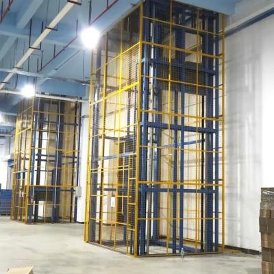 China 4 Post Cage Lift 3000kg Hydraulic Goods Elevator Fully Caged Cargo Elevator for sale