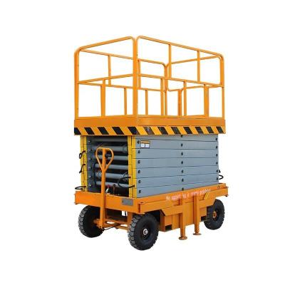 China Outdoor 11m Scissor Lift Manual Towable Mobile Hydraulic Lift for sale