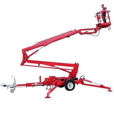 China Load 200kg Trailer Articulating Boom Lift 12m Trailer Mounted Cherry Picker for sale