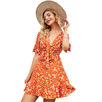 China Summer Ladies Clothing Anti-Static V-Neck Ruffles Bow V-Neck Soft Casual Bow Dresses Women Floral Print Dress for sale