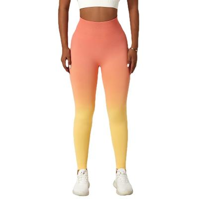 China Reversible Gradual change seamless European and American yoga pants women's sports tights high waist belly running fitness pants for sale