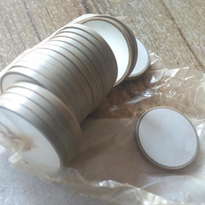 China Round Piezoelectric Ceramic Materials Heat Resistant Customized In White Color for sale