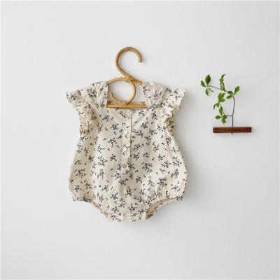 China Hot Selling Lovely Baby Girl Sleeveless Floral Ruffle Romper Short Sleeve Baby Clothes Romper for sale