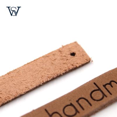 China Viable Customize Embossed Leather Patches Sew On Shirt Logo Tag Clothing Neck Self Adhesive Jeans Brand Women Bags Handbags for sale