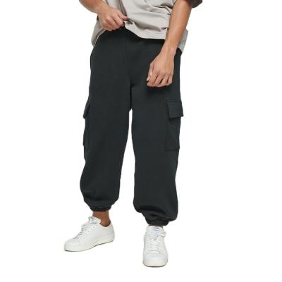 China Breathable Custom Embroidery Logo Hip Pop Sports Loose Fitted Mens Jogger Pants With Knee Pockets for sale