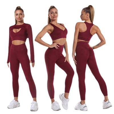 China New Breathable Yoga Set 3 Piece Long Sleeve Crop Top And High Waist Yoga Pants Seamless Yoga Set for sale