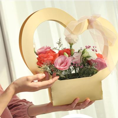 China Recycled Materials Customized Package Square Bottom Heart Shape Luxury Preserved Gift Roses Flower Gift Packaging Box Gift Bag For Christmas for sale