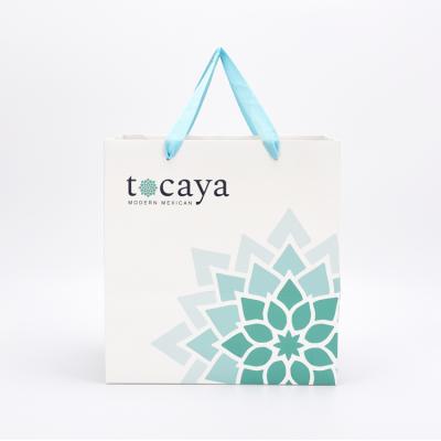 China Recyclable Custom Unique Commercial Luxury Color Printing Gift Shopping Paper Bag for sale