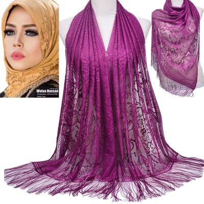 China 2022 Wholesale Casual Women Lace Up Hollow Out Muslim Ethnic Simple Hijab Gauze Scarf Sunscreen Tassel Scarf Solid Color Long Scarf for sale