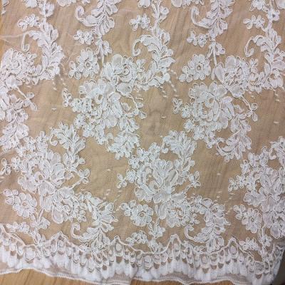 China 2017 hot sale Bridal Wedding Dress Fabric  Mesh Based Embroiery Lace Fabric in Ivory Color for sale