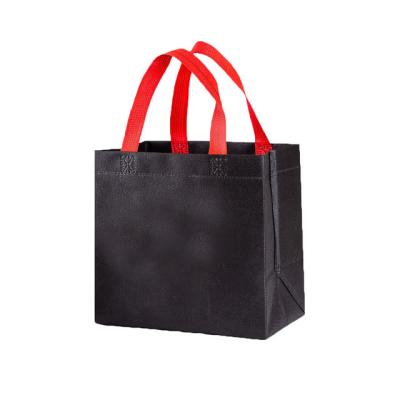 China Eco factory wholesale price reusable non woven handled shopping bag for sale