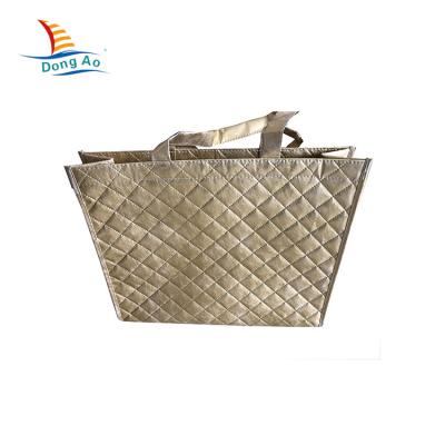 China New Design Recycled Fashion Quilting Laser Splicing With Metallic PU Gold Laminated Nonwoven Bag for sale