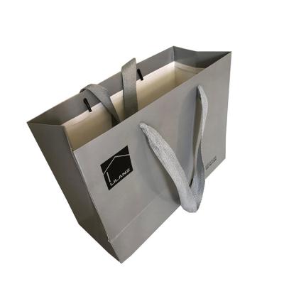 China Recyclable Custom Reusable Biodegradable Gift Handle Shopping Paper Bag for sale