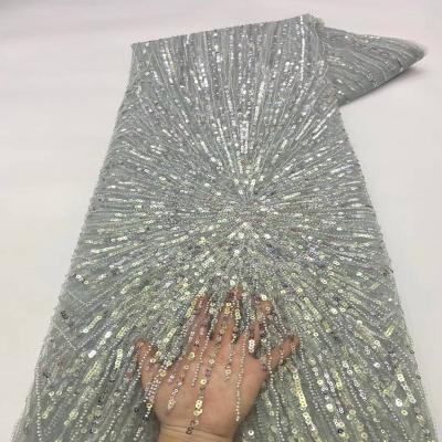 China Hot Viable Style Lady Beading Sequin Fabric Net Lace Wedding Dress Fabric Mesh for sale