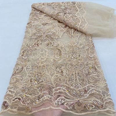 China Viable New Arrival Gorgeous Hand Knitted Pearl Lace Pattern Wedding Dress High End Fabric for sale