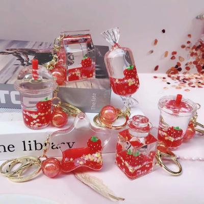 China Comfortable Cute Acrylic Strawberry Sequin Fruit Quicksand Fruit Key Chain 2022 Cartoon Fashion Milk Tea Bottle Floating Key Chain for sale