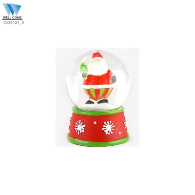 China Custom Europe Resin Mini Snow Globe And Water Ball With Christmas Santa Claus for sale