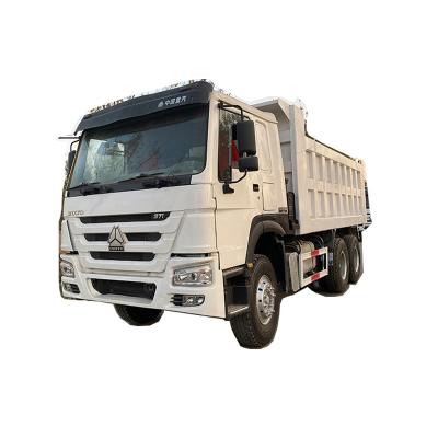 China Popular chinese white used cars and howo 6*4 trucks with driver on left side small tipper cargo dump trucks price in Ghana > 8L for sale