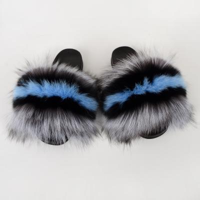 China Fashion trend winter hot pink fur slippers fluffy slides slippers women home indoor ladies real slippers for sale