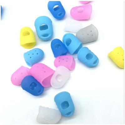 China Non-slip Particle Guitar Silicone Left Hand Finger Silicone Finger Protector Beginners Practice String Finger Cover for sale