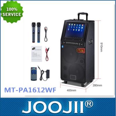 China Professional 500W touch screen cart karaoke speaker with 12inch screen and could connect to 16pcs mics wirelessly at the same time for sale