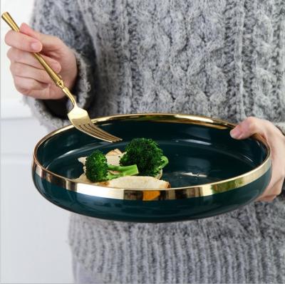 China 2020 Trend Grade Disposable Plating Gilt Porcelain Wedding Top Charger Dishes For Hotel Home Restaurant for sale