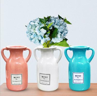 China Europe Nordic Blue Pink White Ceramic Vase With Handle Design Modern Pure Porcelain Vase for sale