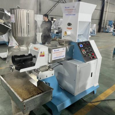 China Automatische trockene Art Fisch-Zufuhr-Extruder-Nahrung- für Haustiereextruder-Maschinen-sich hin- und herbewegende Fisch-Futtermühle zu verkaufen