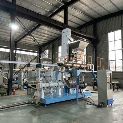 China TWIN SCREW FEED EXTRUDER TILAPIA FLOATING FISH FEED PRODUCTION MACHINE CE / SGS CERTIFIED zu verkaufen